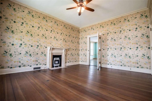 unfurnished living room featuring crown molding, dark wood-type flooring, and ceiling fan