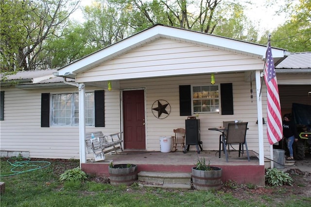 bungalow-style home with a porch