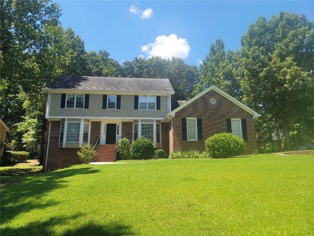 240 W Huntington Rd, Bogart, GA 30622 - colonial inspired home with brick siding and a front yard