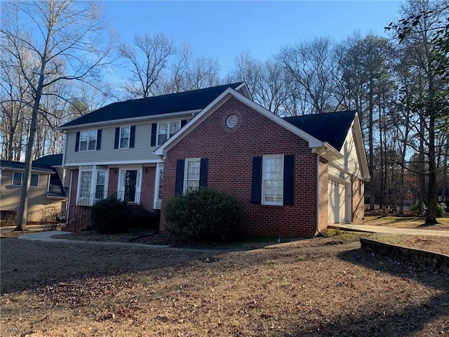 240 W Huntington Rd, Bogart, GA 30622 - view of front of property with brick siding and an attached garage