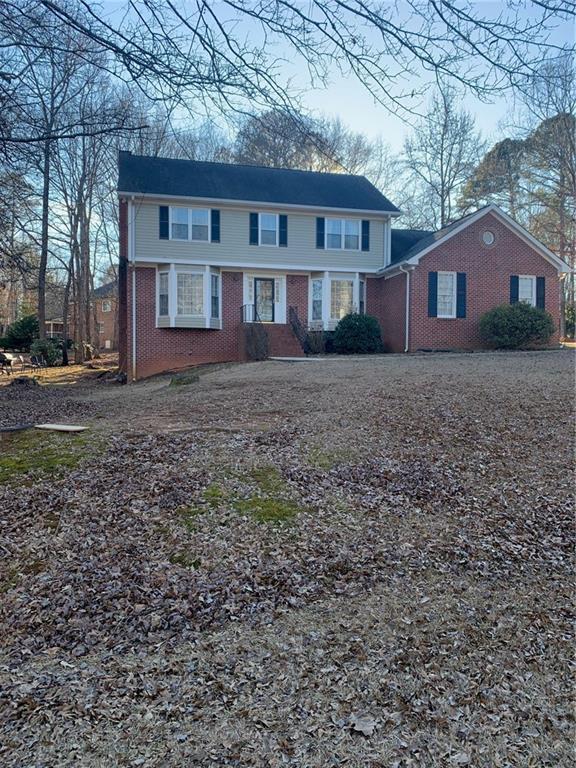 240 W Huntington Rd, Bogart, GA 30622 - view of front facade featuring brick siding