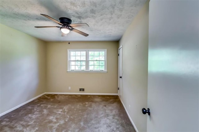 516 Jordan Dr NW, Tucker, GA 30084 - spare room featuring carpet, a ceiling fan, and a textured ceiling
