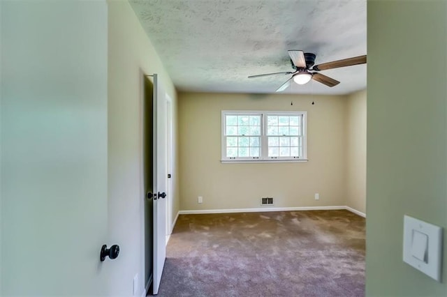 516 Jordan Dr NW, Tucker, GA 30084 - carpeted empty room with a ceiling fan and a textured ceiling