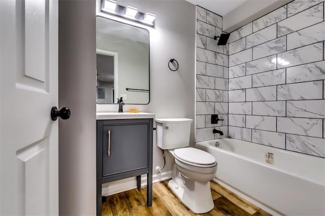 516 Jordan Dr NW, Tucker, GA 30084 - full bath with vanity, tub / shower combination, and wood finished floors