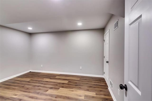 516 Jordan Dr NW, Tucker, GA 30084 - spare room with recessed lighting and wood finished floors