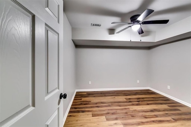 516 Jordan Dr NW, Tucker, GA 30084 - empty room with ceiling fan and wood finished floors