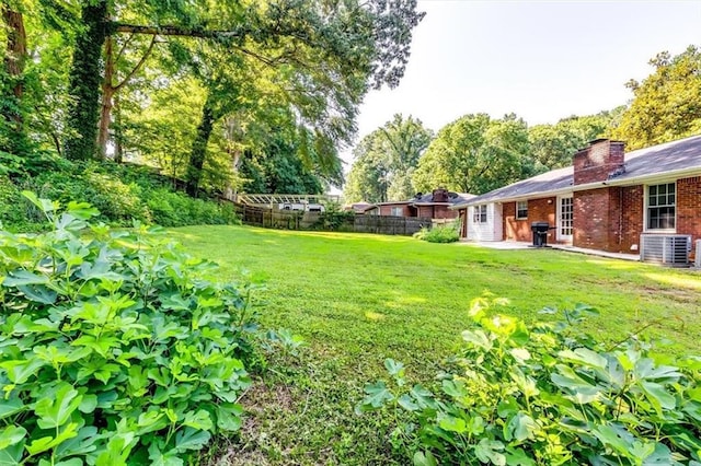 516 Jordan Dr NW, Tucker, GA 30084 - view of yard with a patio area