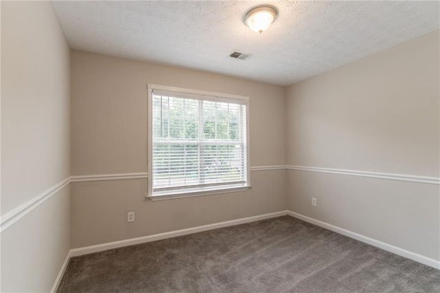 6683 Princeton Park Ct, Lithonia, GA 30058 - carpeted spare room featuring baseboards and a textured ceiling