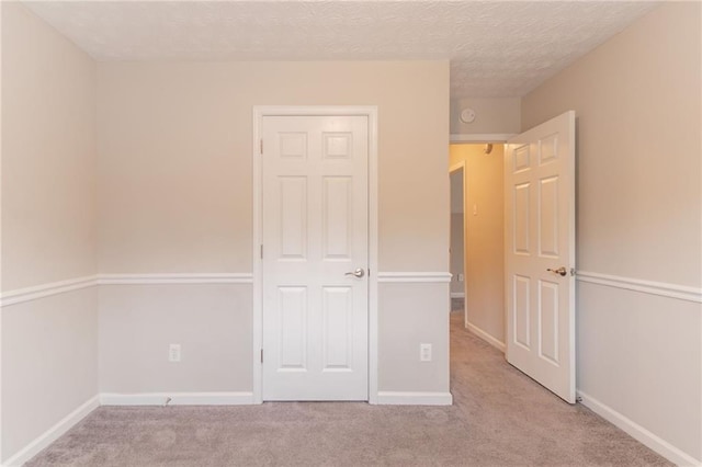6683 Princeton Park Ct, Lithonia, GA 30058 - unfurnished bedroom featuring carpet and baseboards