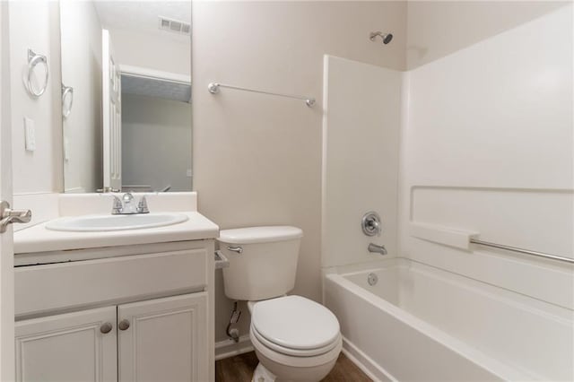6683 Princeton Park Ct, Lithonia, GA 30058 - bathroom with toilet, vanity, and tub / shower combination
