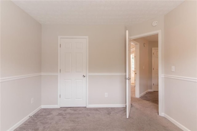 6683 Princeton Park Ct, Lithonia, GA 30058 - unfurnished bedroom with carpet, baseboards, and a closet