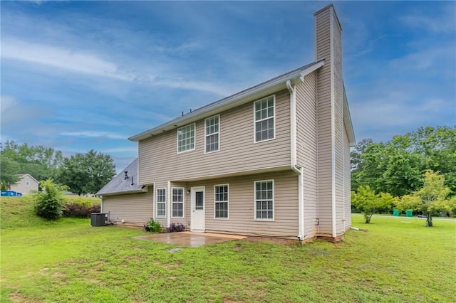6683 Princeton Park Ct, Lithonia, GA 30058 - rear view of property featuring central AC unit, a patio, a chimney, and a yard