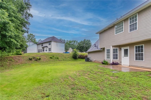 6683 Princeton Park Ct, Lithonia, GA 30058 - view of green lawn with a patio area and central AC unit