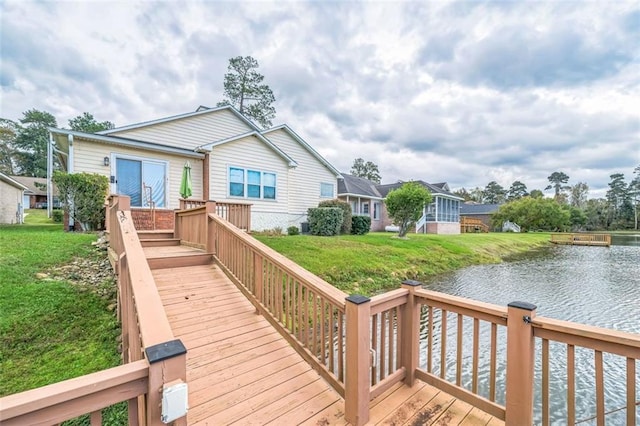 exterior space featuring a water view and a yard