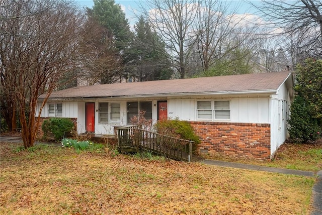 ranch-style home with covered porch