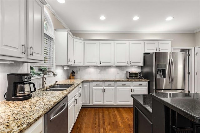 2759 Thomashire Trce, Marietta, GA 30066 - kitchen with stainless steel appliances, white cabinetry, ornamental molding, dark wood-style floors, and recessed lighting