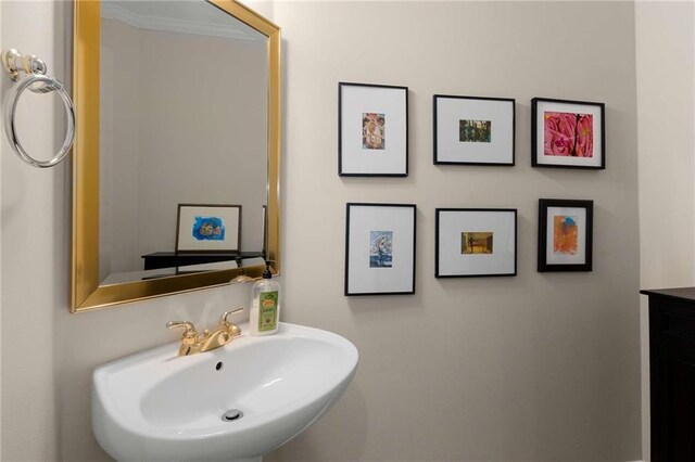 2759 Thomashire Trce, Marietta, GA 30066 - bathroom with a sink and crown molding