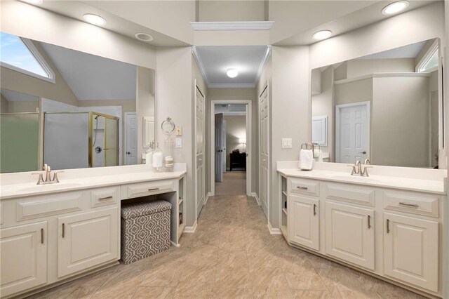 2759 Thomashire Trce, Marietta, GA 30066 - full bath featuring a stall shower, two vanities, crown molding, connected bathroom, and recessed lighting