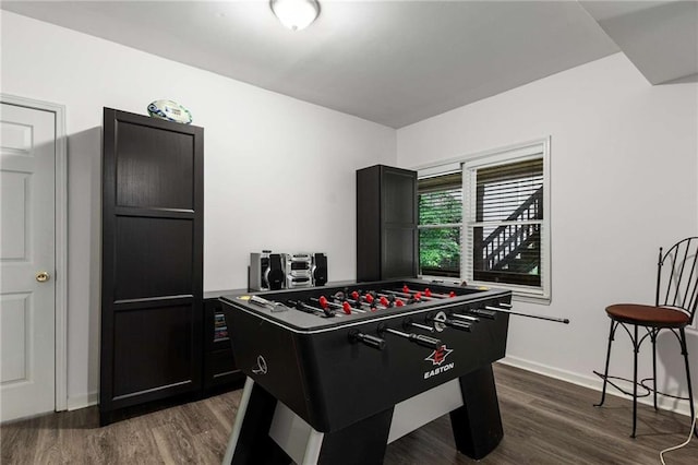 2759 Thomashire Trce, Marietta, GA 30066 - playroom with dark wood-style floors and baseboards