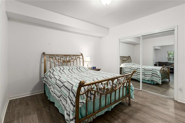 2759 Thomashire Trce, Marietta, GA 30066 - bedroom featuring wood finished floors and a closet