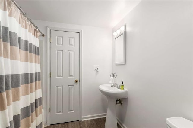 2759 Thomashire Trce, Marietta, GA 30066 - bathroom featuring wood finished floors and curtained shower