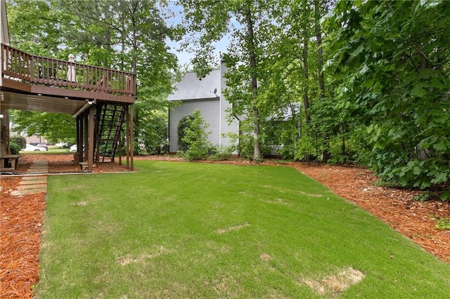 2759 Thomashire Trce, Marietta, GA 30066 - view of grassy yard with a deck and stairs