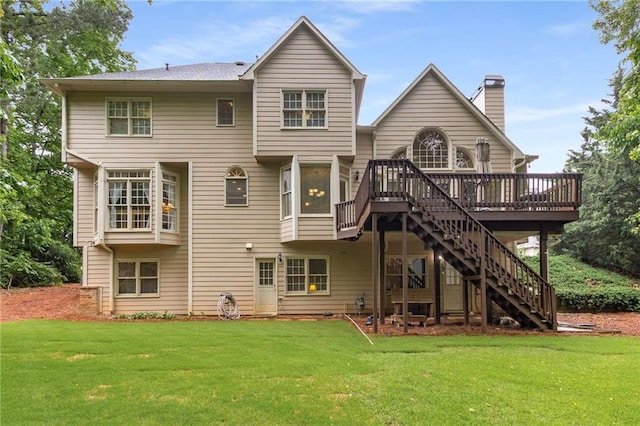 2759 Thomashire Trce, Marietta, GA 30066 - rear view of house featuring stairs, a wooden deck, a chimney, and a lawn