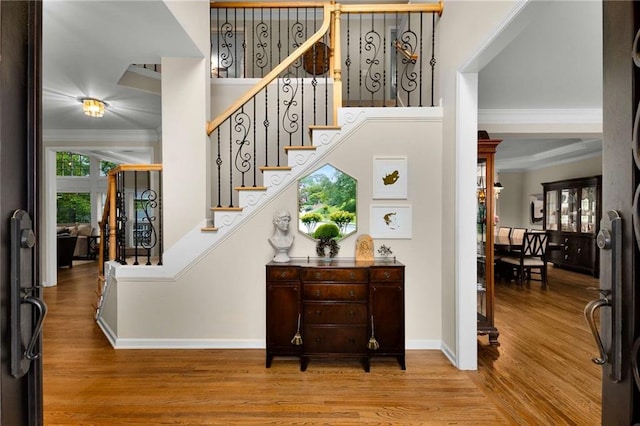 2759 Thomashire Trce, Marietta, GA 30066 - entryway with wood finished floors, stairs, and crown molding