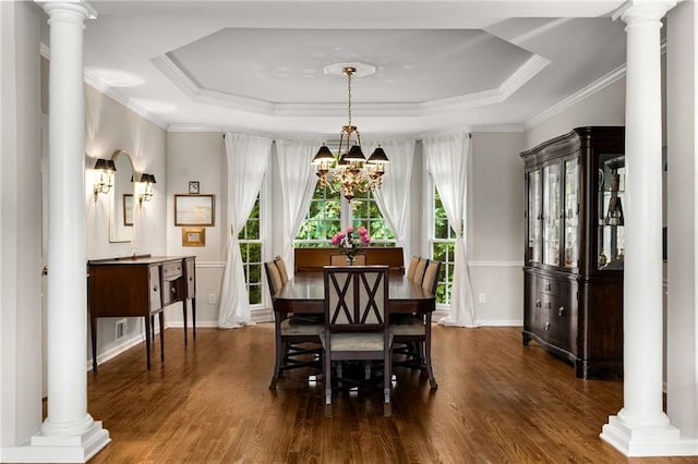 2759 Thomashire Trce, Marietta, GA 30066 - dining space with a raised ceiling, wood finished floors, ornamental molding, and a chandelier