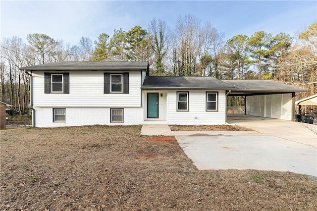 split level home featuring a carport