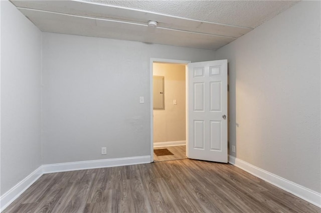 2817 Burton Rd NW, Atlanta, GA 30311 - empty room featuring wood finished floors and baseboards