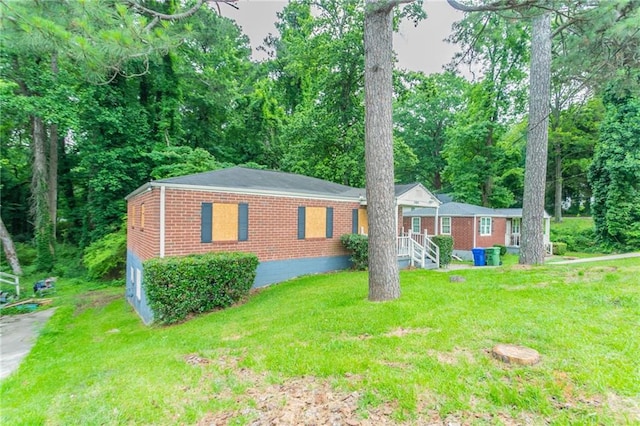 2817 Burton Rd NW, Atlanta, GA 30311 - single story home featuring brick siding and a front yard