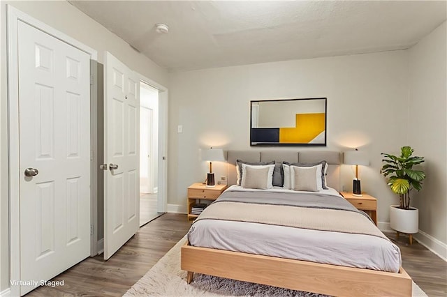 2817 Burton Rd NW, Atlanta, GA 30311 - bedroom featuring wood finished floors and baseboards