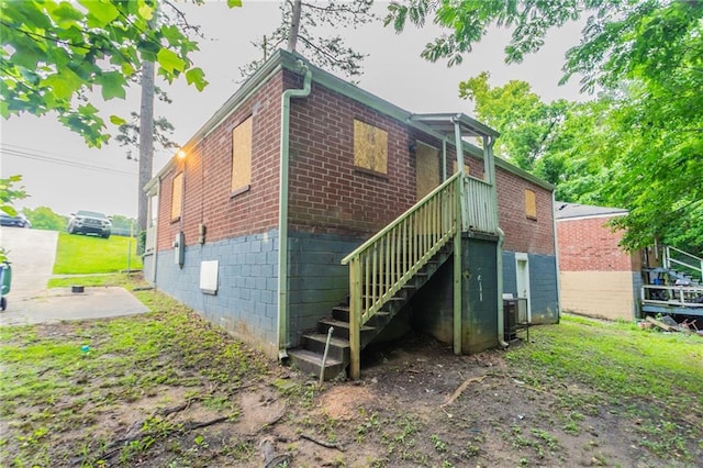 2817 Burton Rd NW, Atlanta, GA 30311 - rear view of property with stairway and brick siding