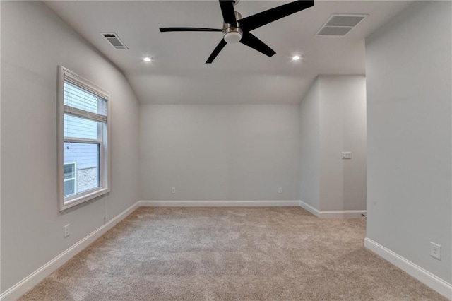 carpeted empty room with a ceiling fan, recessed lighting, and baseboards