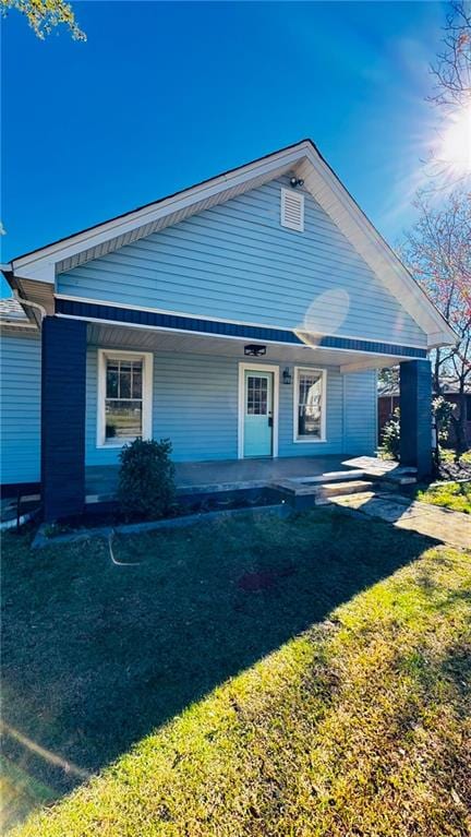 view of front of home with a carport