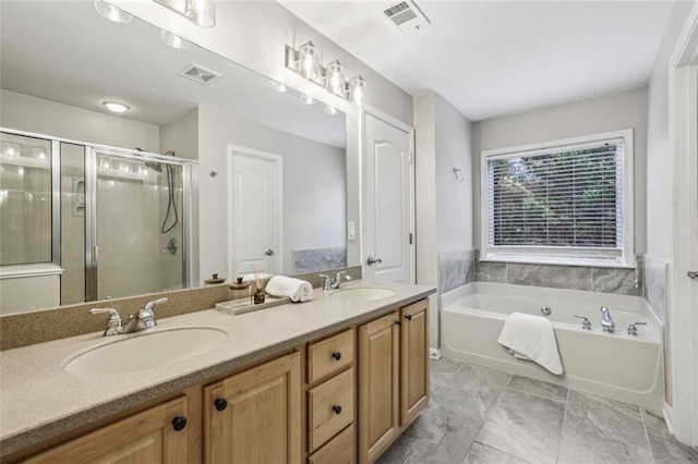 full bath with a sink, visible vents, a garden tub, and a stall shower