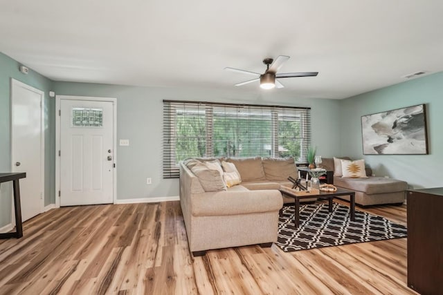 1977 Wee Kirk Rd SE, Atlanta, GA 30316 - living room with wood finished floors, ceiling fan, and baseboards