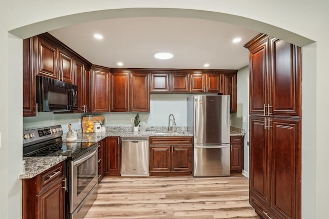 1977 Wee Kirk Rd SE, Atlanta, GA 30316 - living room with wood finished floors, ceiling fan, and baseboards