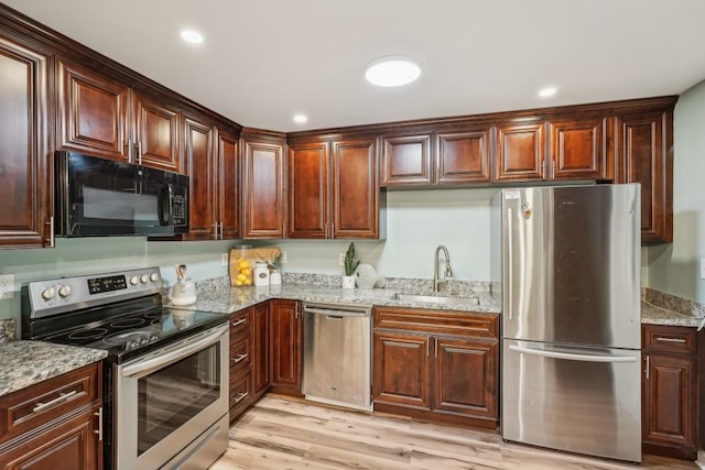 1977 Wee Kirk Rd SE, Atlanta, GA 30316 - living area with a ceiling fan, plenty of natural light, and wood finished floors