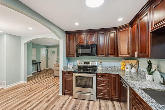 1977 Wee Kirk Rd SE, Atlanta, GA 30316 - dining space featuring light wood finished floors, a chandelier, baseboards, and recessed lighting