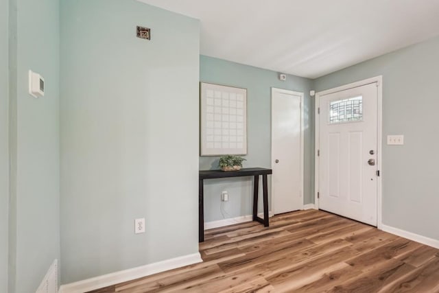 1977 Wee Kirk Rd SE, Atlanta, GA 30316 - dining room with arched walkways, light wood-style floors, baseboards, recessed lighting, and a chandelier