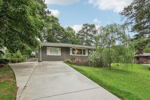 1977 Wee Kirk Rd SE, Atlanta, GA 30316 - back of property with a yard and roof with shingles