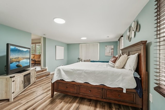 1977 Wee Kirk Rd SE, Atlanta, GA 30316 - spare room with wood finished floors, ceiling fan, and baseboards