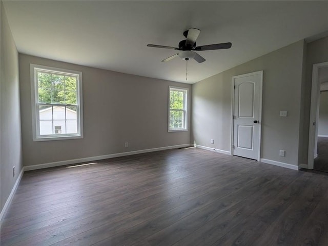 732 Five Points Rd, Buchanan, GA 30113 - empty room with plenty of natural light, dark wood-style flooring, a ceiling fan, and lofted ceiling