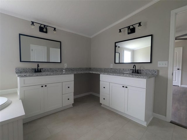 732 Five Points Rd, Buchanan, GA 30113 - full bath featuring two vanities, crown molding, track lighting, and tile patterned flooring