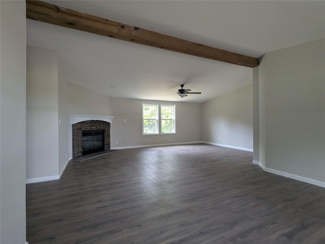 732 Five Points Rd, Buchanan, GA 30113 - unfurnished living room featuring dark wood finished floors, a ceiling fan, and a stone fireplace
