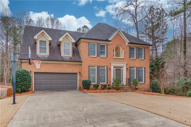 colonial inspired home with a garage