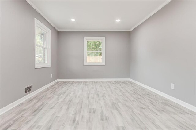 spare room with ceiling fan and light hardwood / wood-style floors