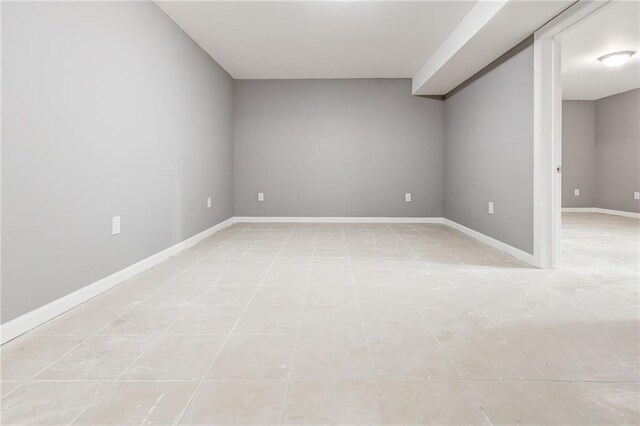 interior space featuring sink and tile patterned flooring